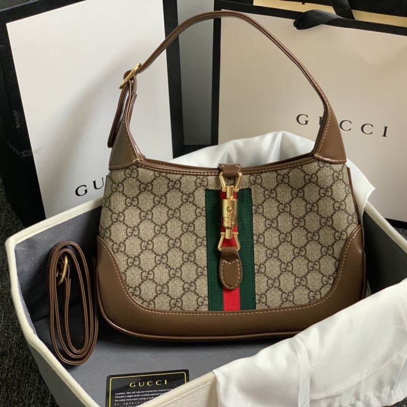 G*u*i top handle bags